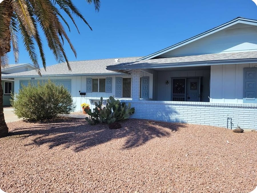 Two car garage with parking in front.