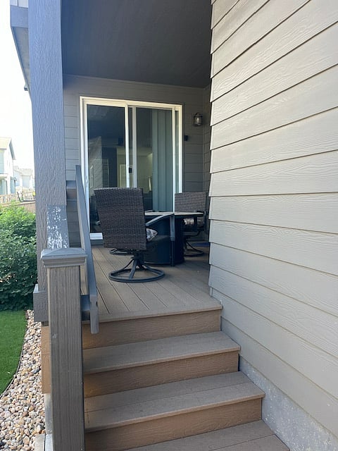 Covered back porch off dining room