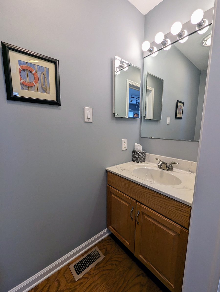 Half Bathroom off of the First Floor Kitchen. 