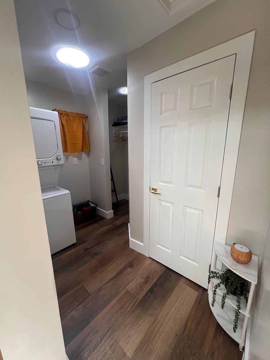Short hallway leading to the washer/dryer, closet, and door to the bathroom