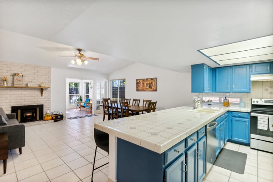 View of kitchen, family room and main dining table