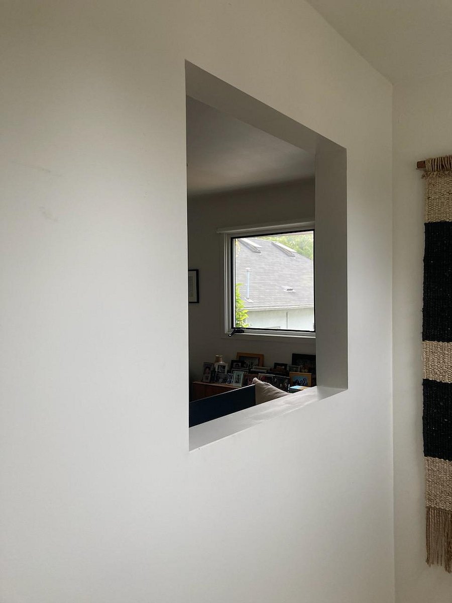 Interior window into den/second bedroom