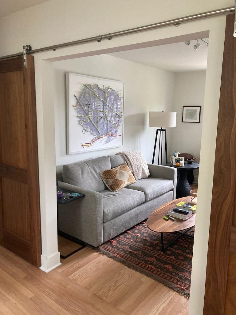 Den/bedroom with pull out sleeper couch.