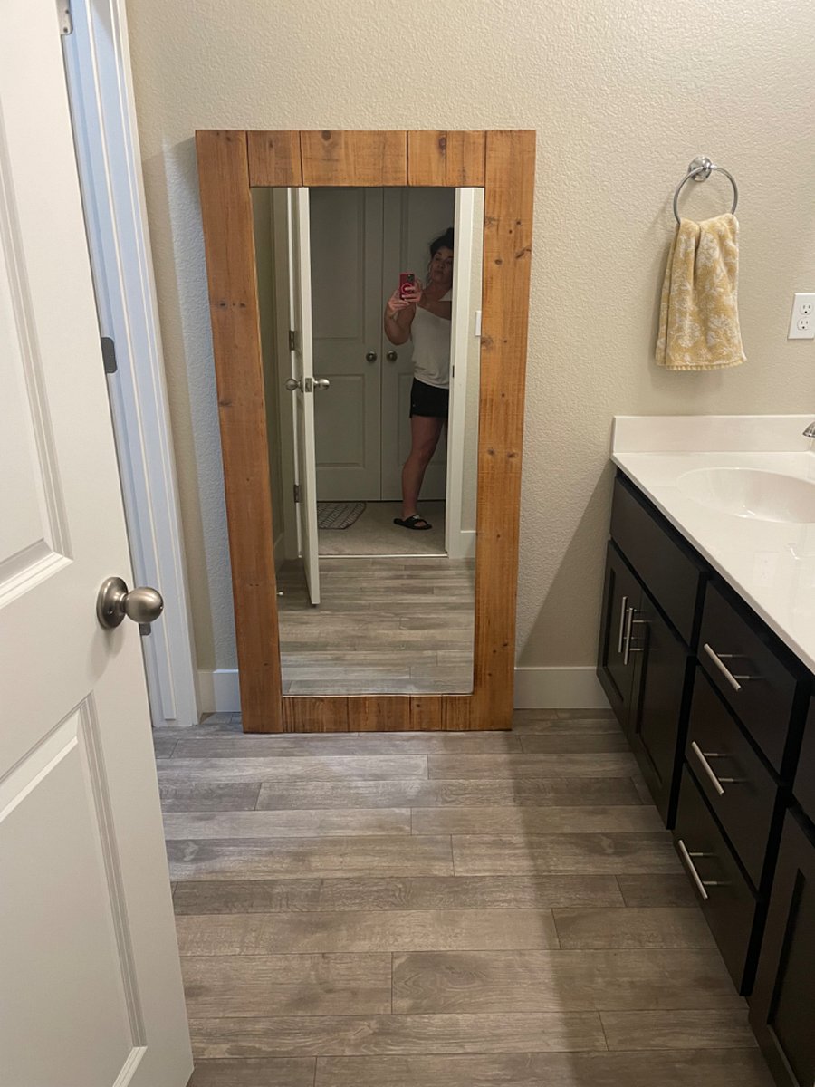 Spare bathroom. This bathroom has dual sinks. A door that separates wash area that leads to a private toilet and shower.
