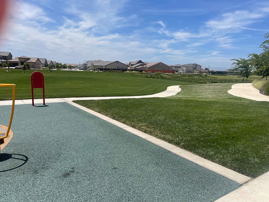 Park. 1 block away. Walking, running track & playground w/barbecue area.