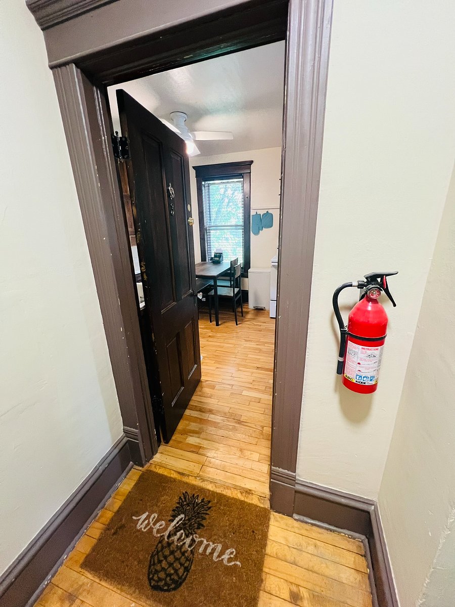 Entrance to apartment at top of interior stairs