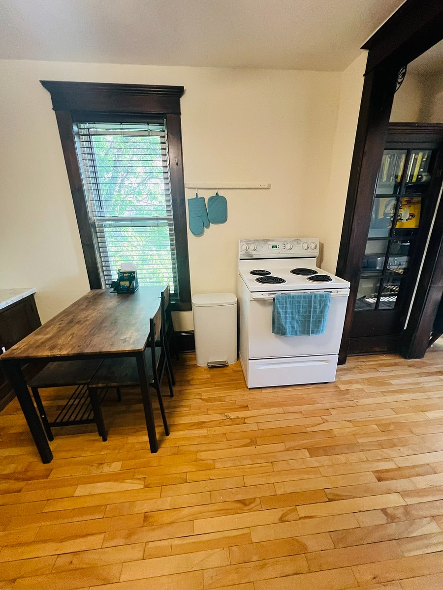 Kitchen table includes two chairs and a bench