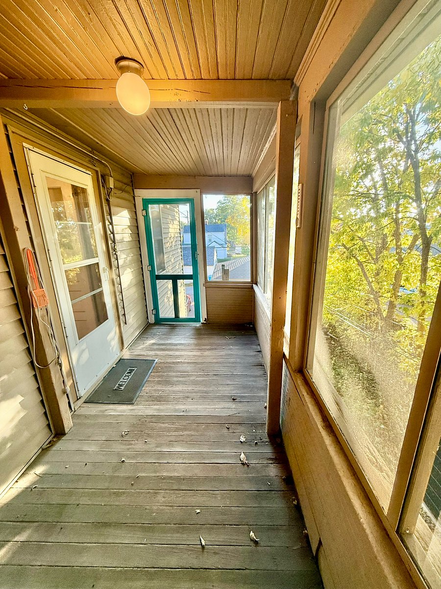 Private screen porch outside kitchen door. 