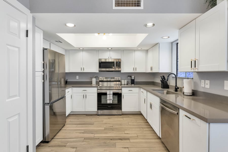 Light and bright w/ plenty of storage and counter space for the cook.
