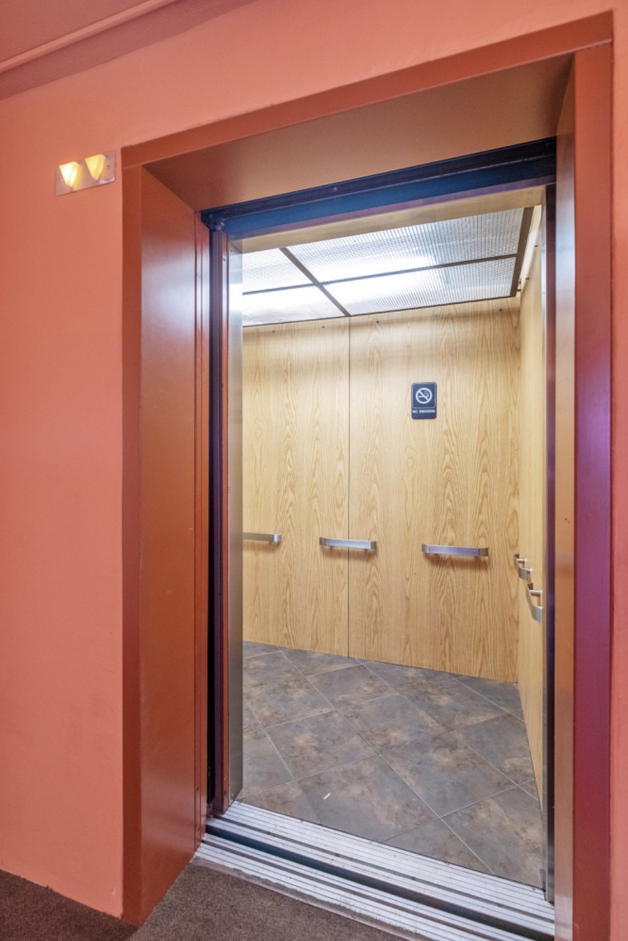 Updated elevators ready to take you to the 4th floor, the top floor.