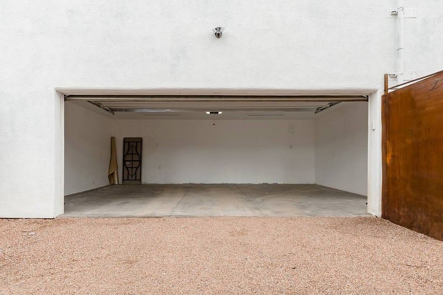 Standard 2-car garage. Trucks and large SUV's will most likely not fit. Read notes in listing description