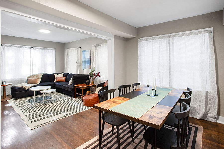 The open concept living makes the living room and dining room for bright and feels airy and spacious. 