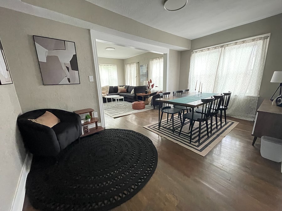 The open spacious living and dining room has so much room and space for enjoying the space with others.
