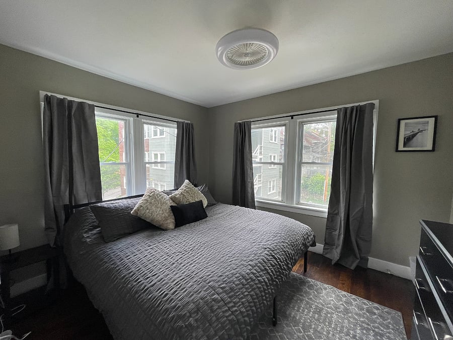 The back bedroom has a king sized bed and fresh bedding.