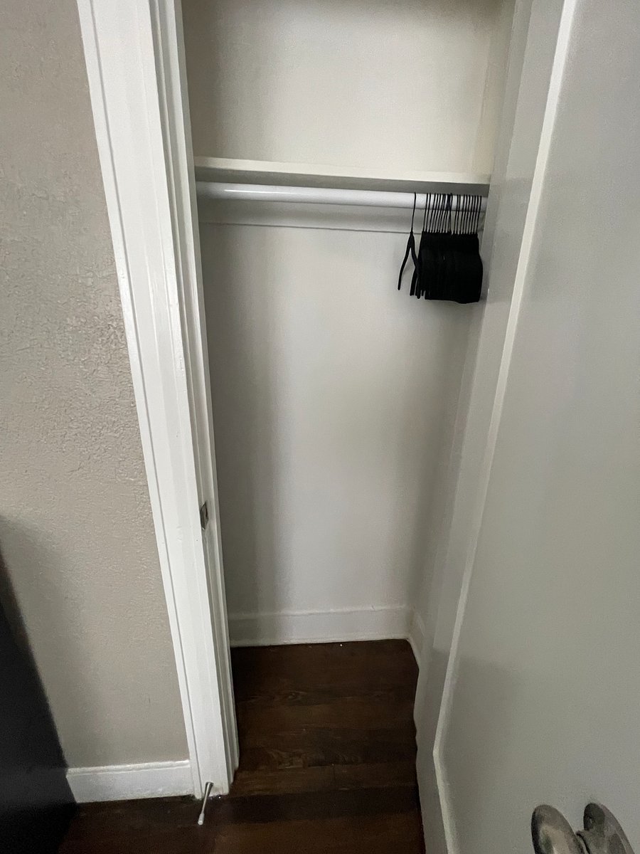 The closet in the first bedroom with queen bed. There is also soft hanging baskets to help with maximizing storage.
