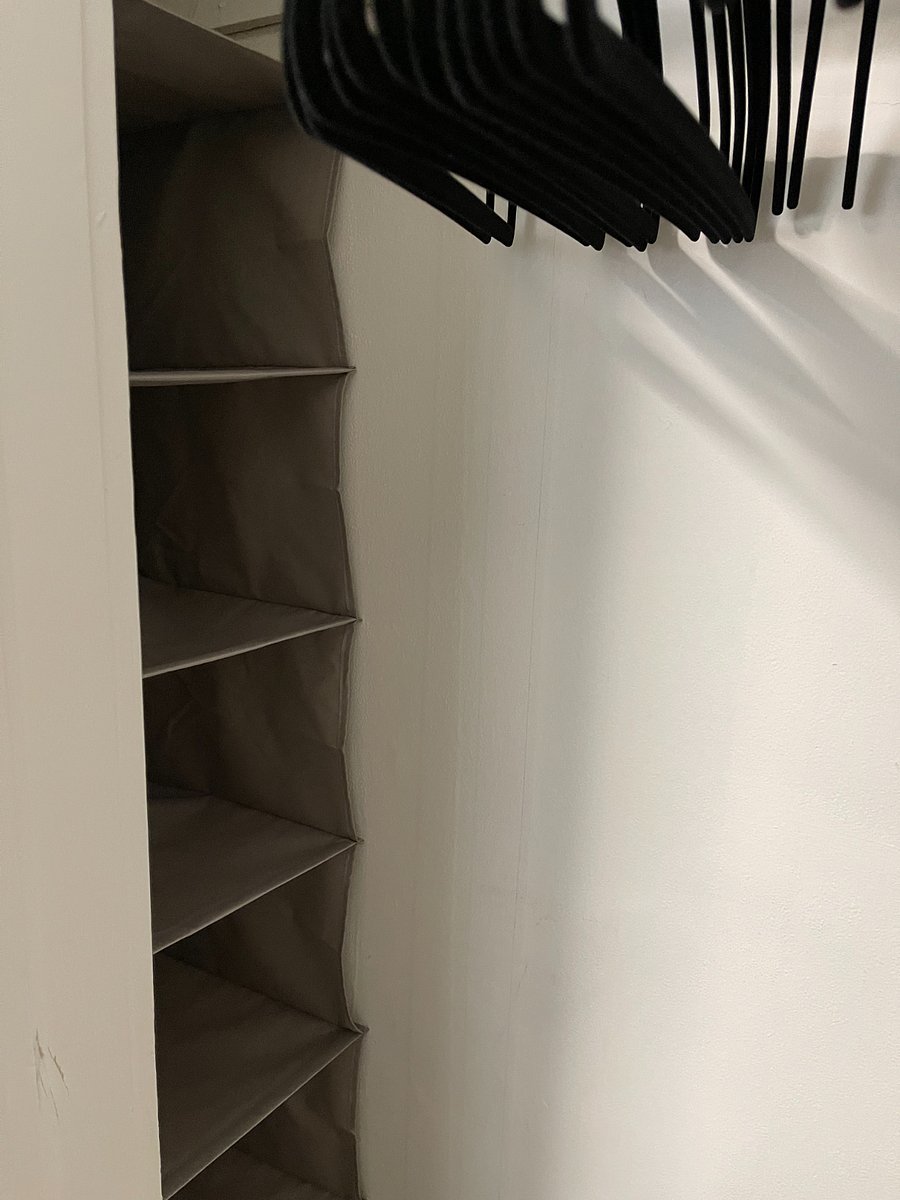 We sneak in this extra storage for holding pants or shirts as well to the make the space more functional