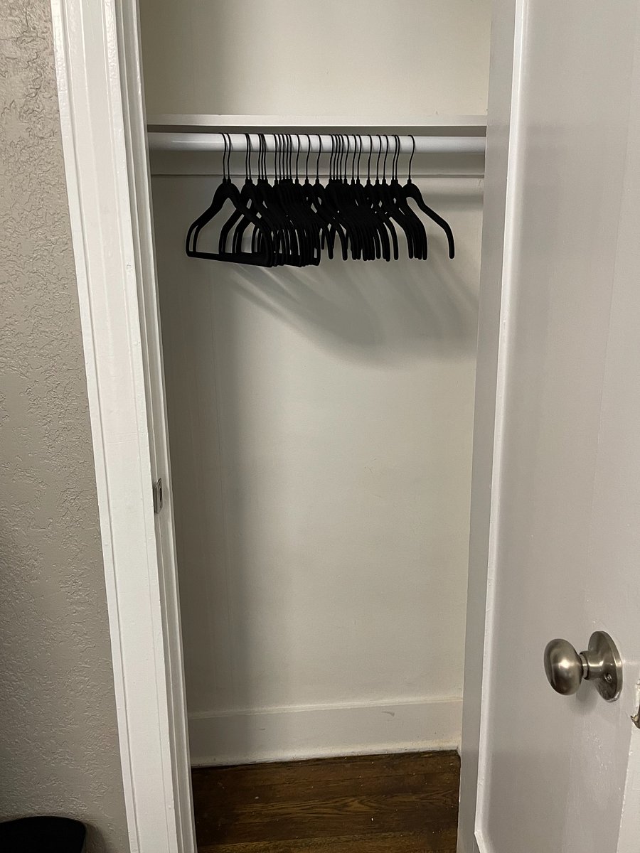 The closet is small but mighty with storage.