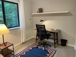 Office desk with forest view