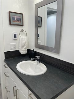 Sink, cabinet with storage and medicine cabinet