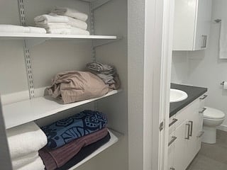 Linen closet and bathroom entrance