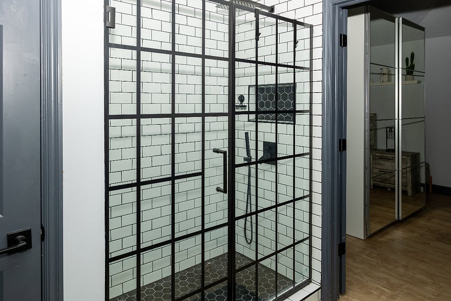 Master shower with two shower heads.