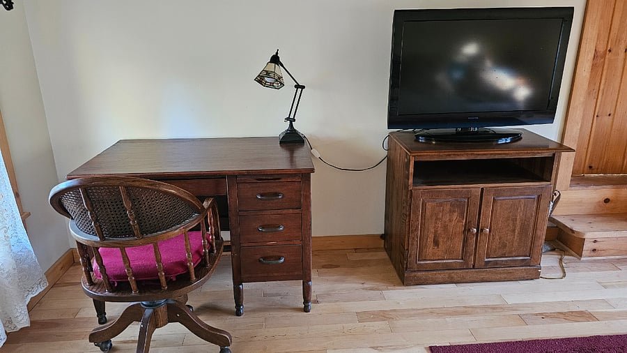 This is a solid wood desk with top refinished, with my favorite office chair, which is here because it matches the furniture. We have other modern ones to pick from!