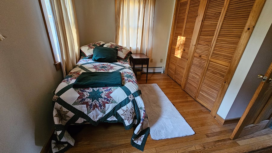 This very high-end hospital bed goes up and down (head and feet) with massage. It has very comfortable mattress. We do have a double bed if needed both to replace this and in the living room futon. We can also provide light-blocking curtains if you need them.