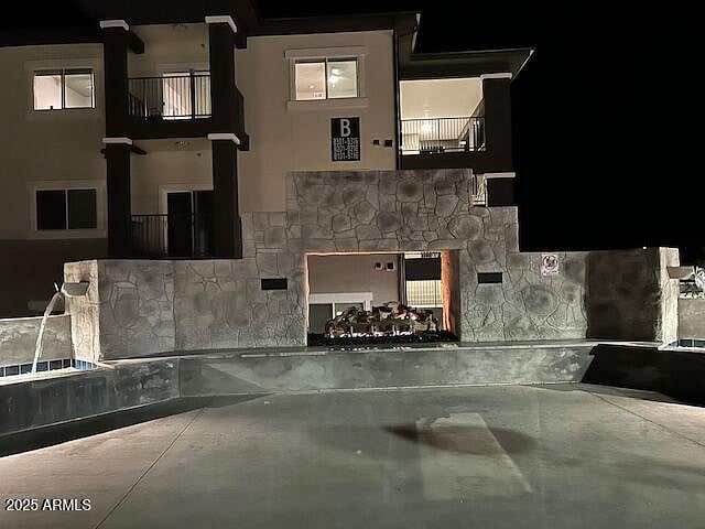 Outdoor fireplace by clubhouse
