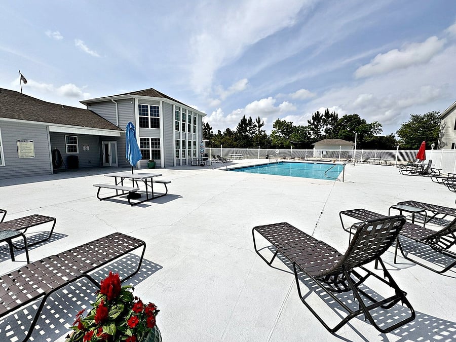 Newly redone pool area just steps from condo.
