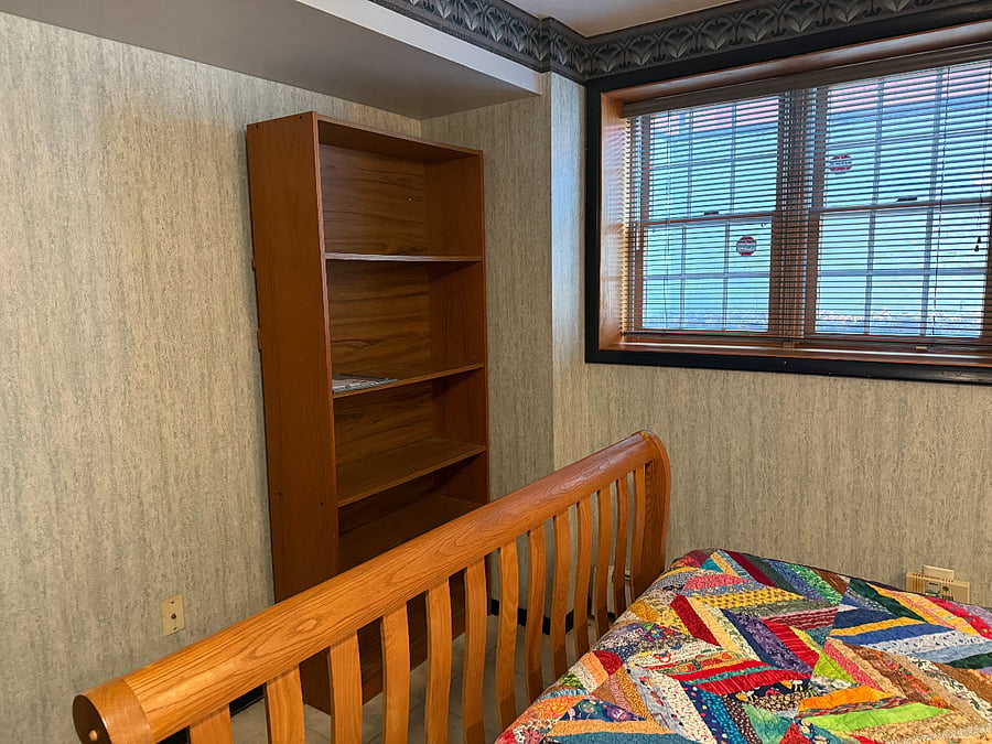 Bed and bookshelf