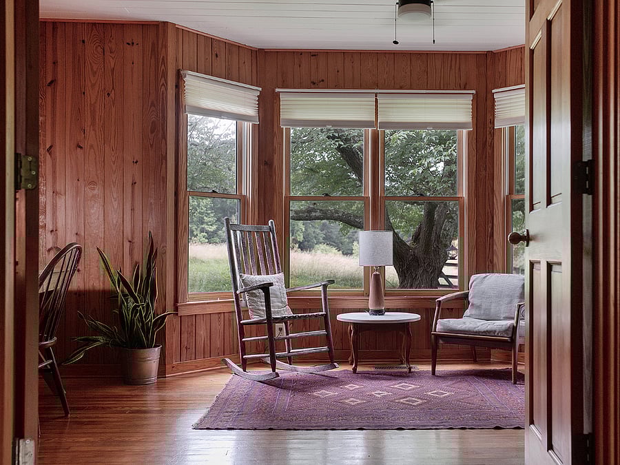 "Meadowview" bedroom. Full size bed, desk, sitting area, dresser.