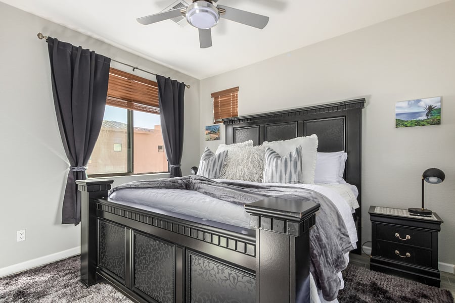 Master bedroom with lovely pictures of Hawaii! 