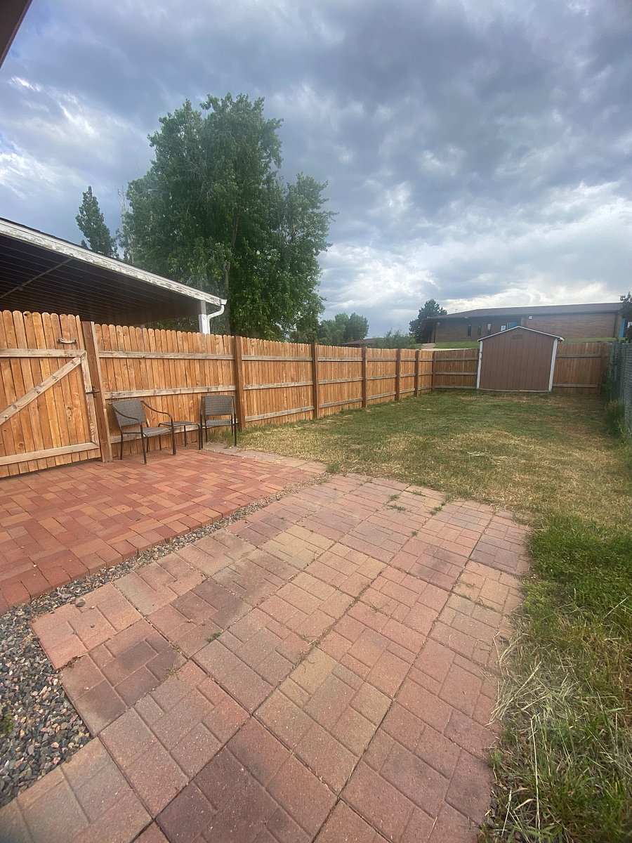 Private backyard with gated area, also to the entry for the garage to access private entrance for Furnished Finder located with easy access to basement 