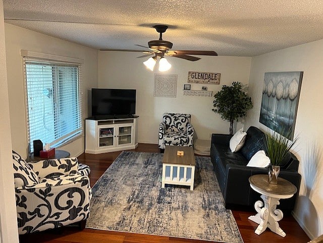Living room w/ window facing the pool