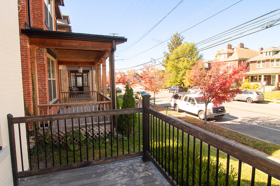 View from the front porch of the surrounding neighborhood.  Plenty of free street parking out front or parking in the rear of the unit on the grass.
