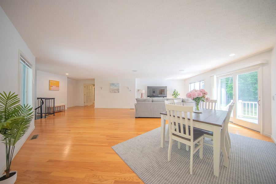 Massive open concept living room with 75 inch google TV