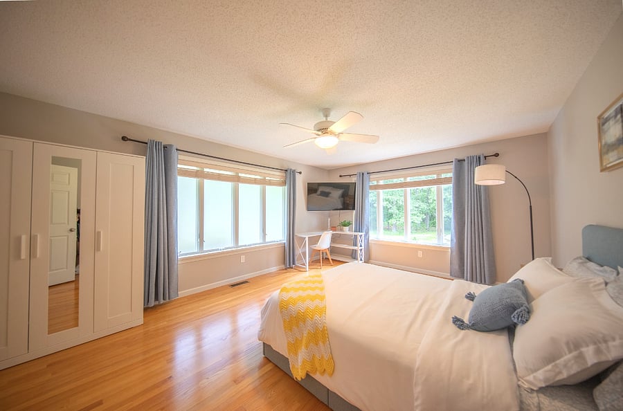 Bedroom 2 large windows to forest