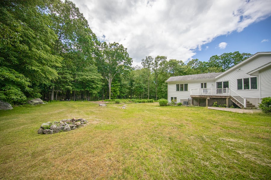 Massive backyard that the deck and bedrooms look at. 