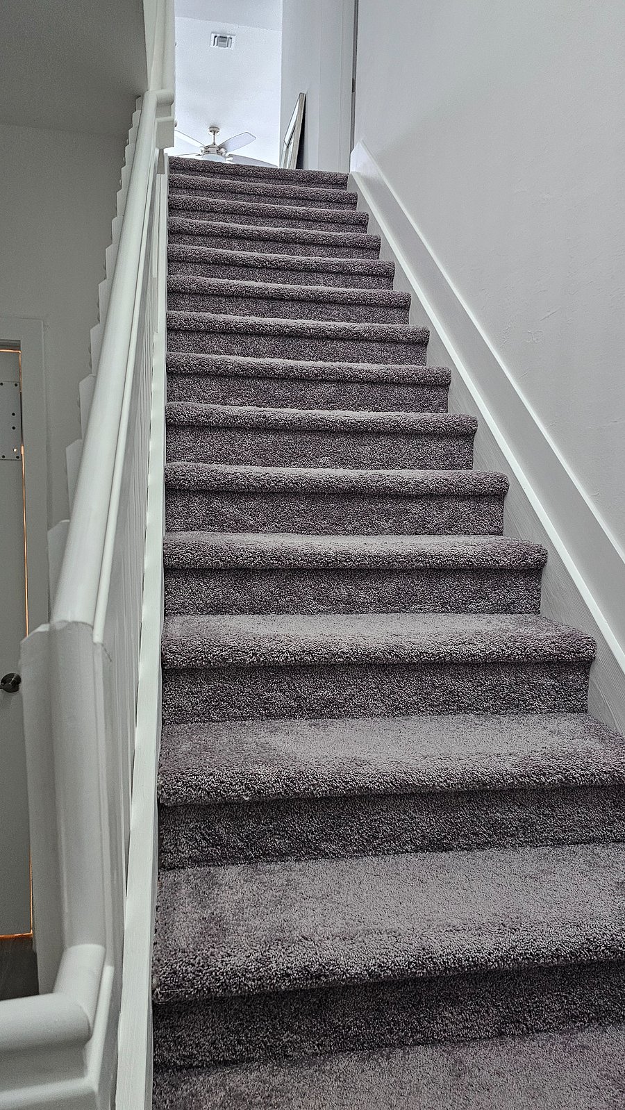 staircase to living area there is also an elevator
