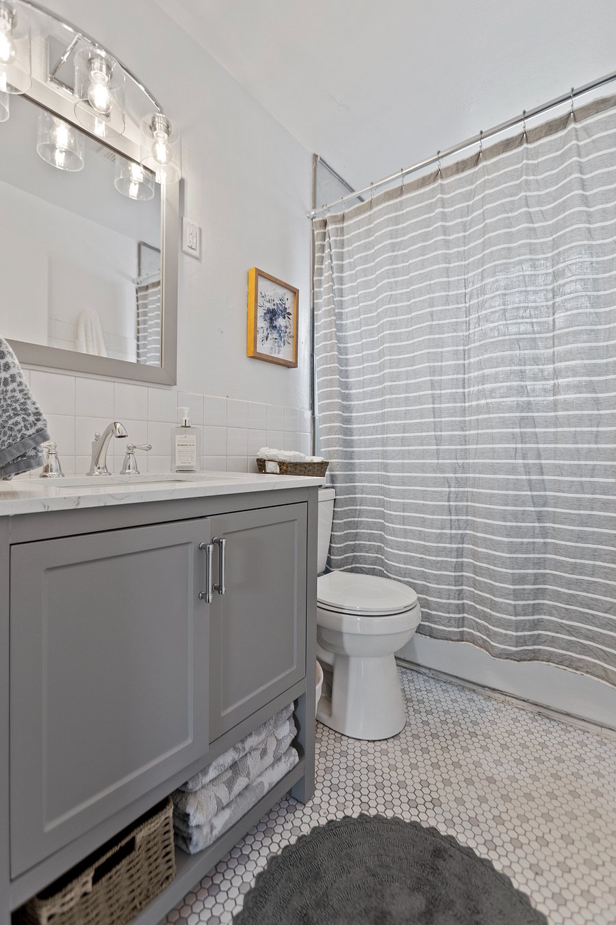 Main Bathroom with shower and tub.