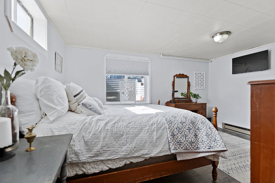Bedroom with queen bed.