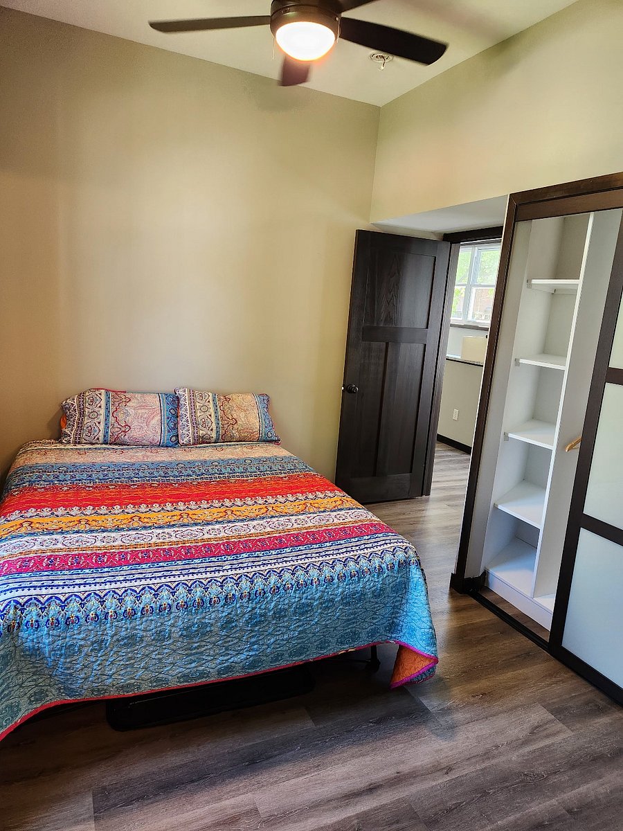 Room with attached bathroom.