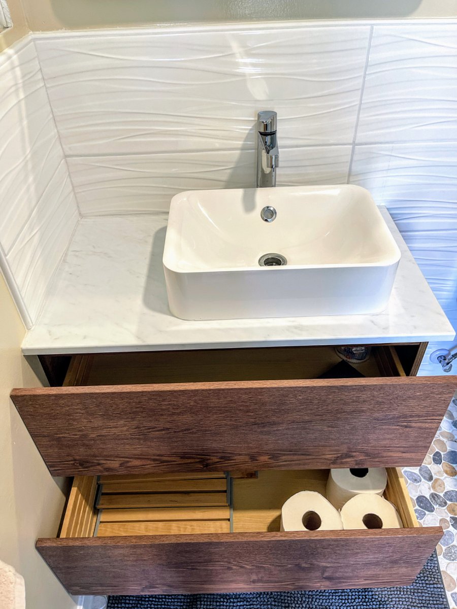 plenty of vanity storage for toiletries