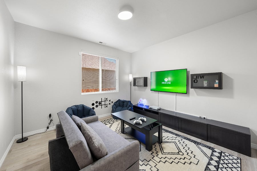 The only bedroom in the 1st floor! Convertible sofa bed comes with a 55" TV and a Xbox!