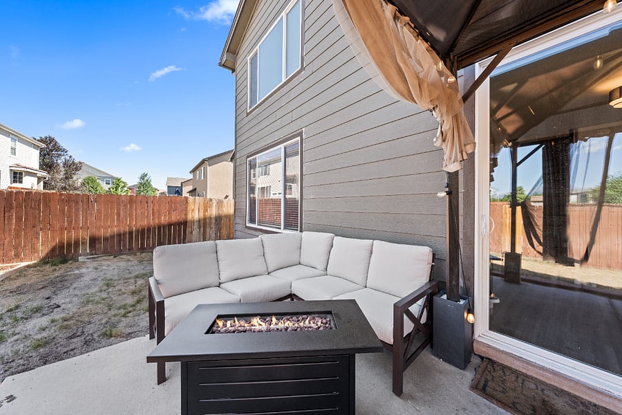 Outdoor seating with propane fire pit to enjoy fun conversations in the evening!