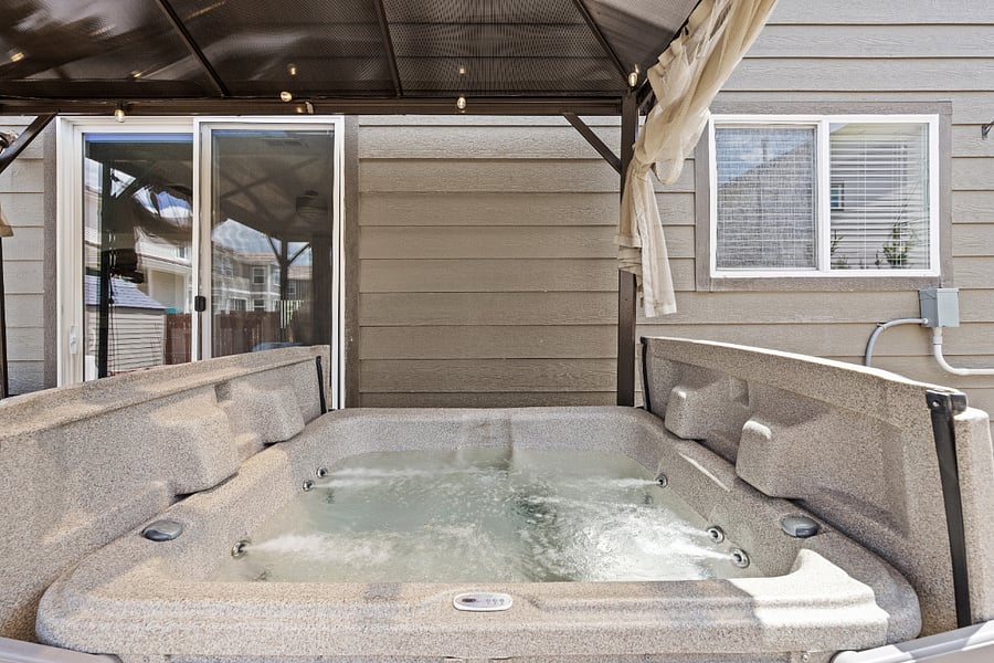 Hot Tub while covered by our pergola!
