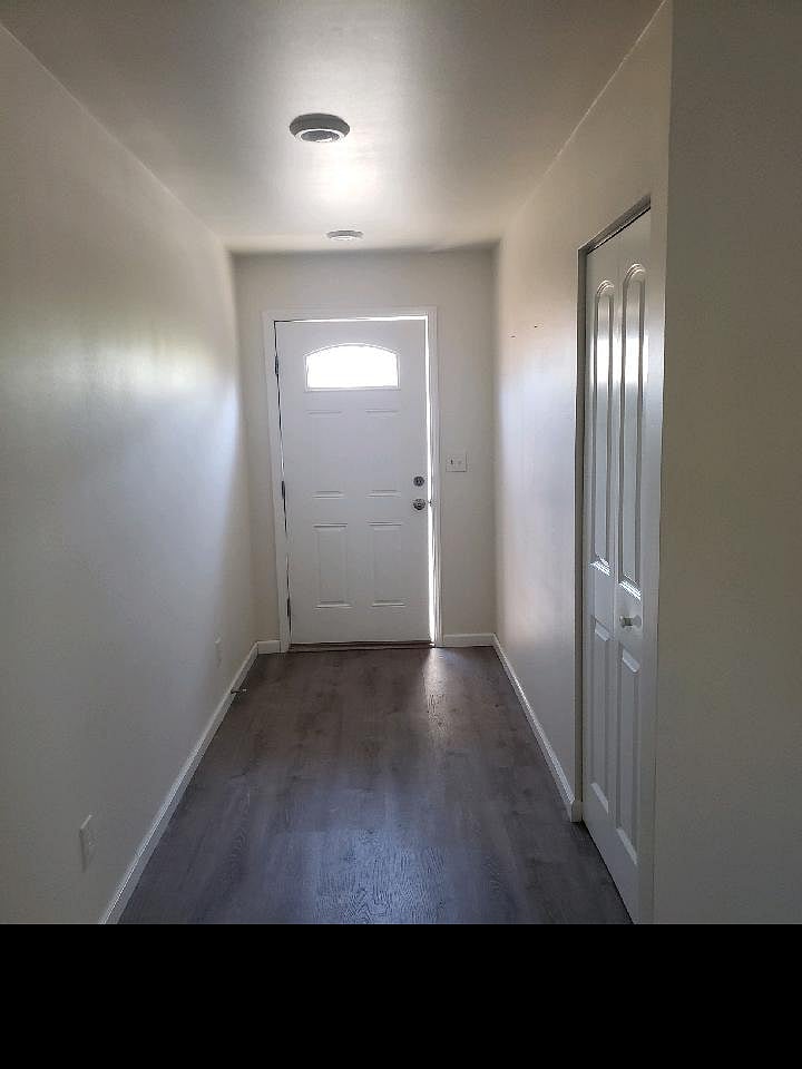 Front hall with coat closet.