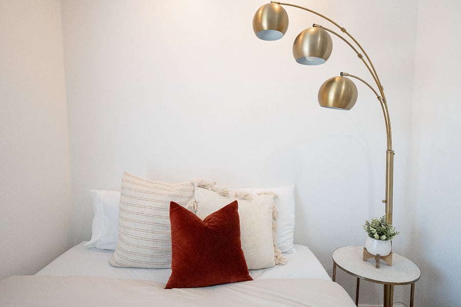 Bedroom detail with fresh linens, curated decor, and a calming neutral palette. Fully furnished Daly City rental