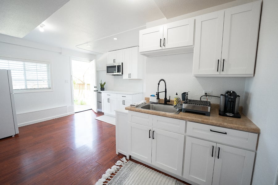 Kitchen essentials included: cookware, dishware, utensils, and small appliances. Just bring your suitcase.