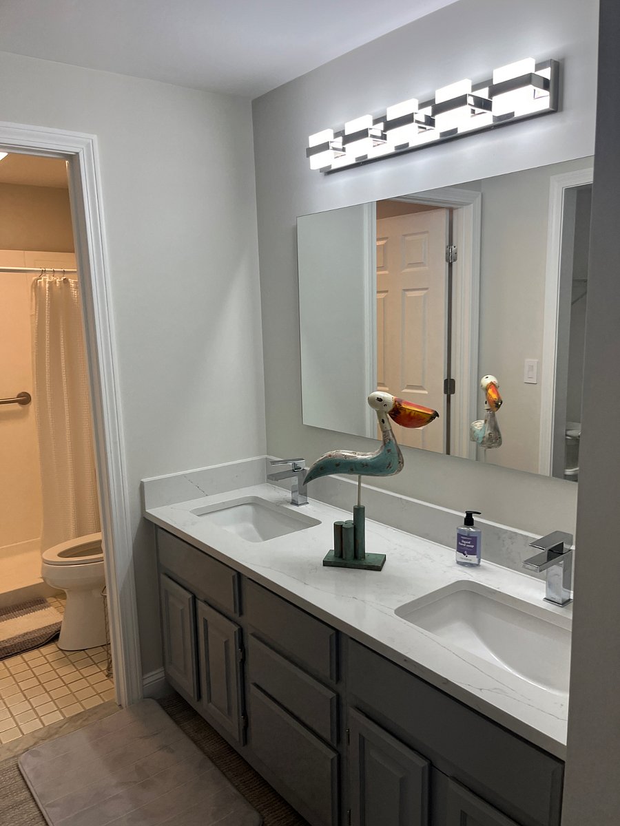Bathroom with walk in shower.
